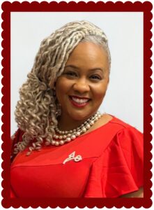 Smiling woman in red dress with scalloped frame