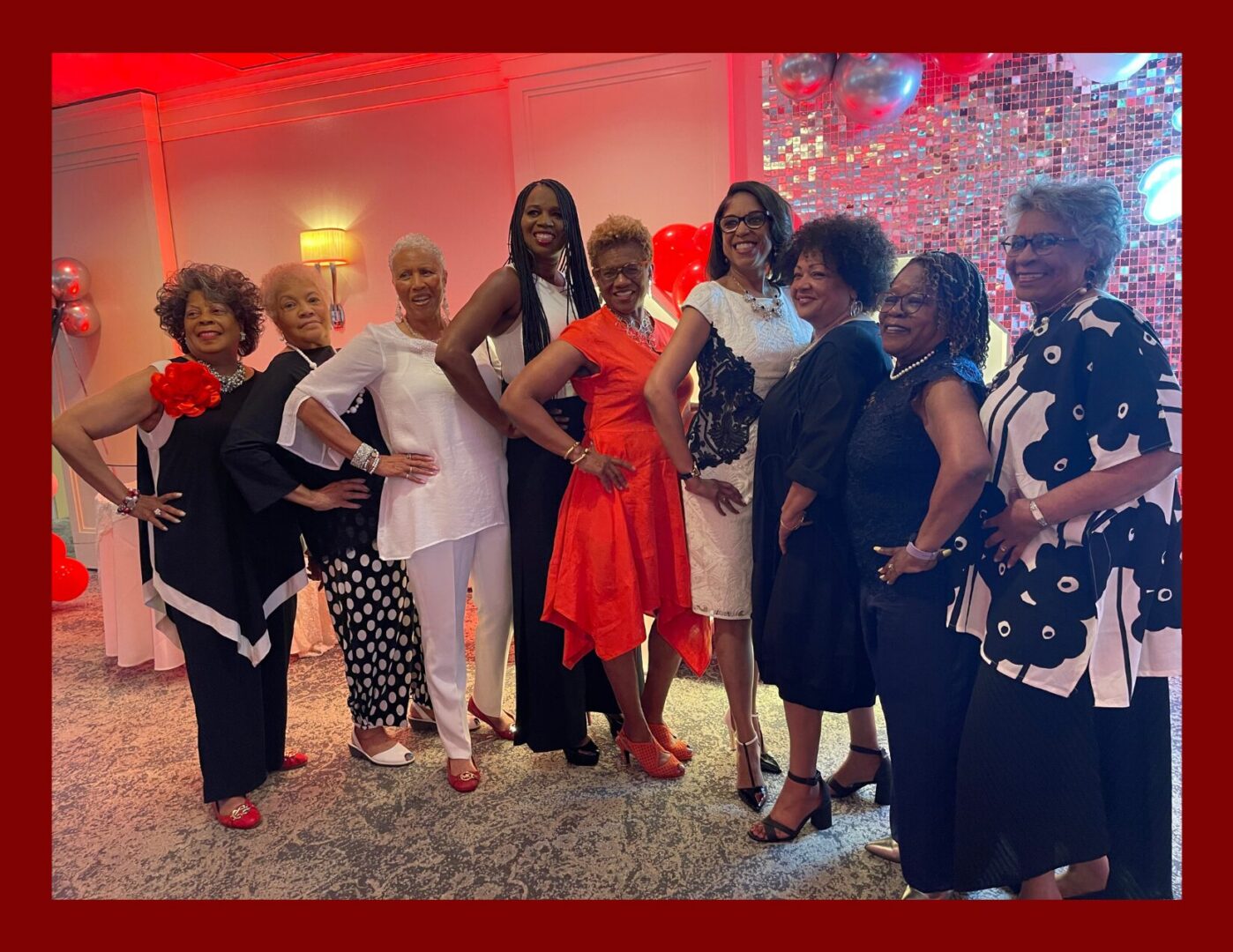 Group of women posing at a festive event
