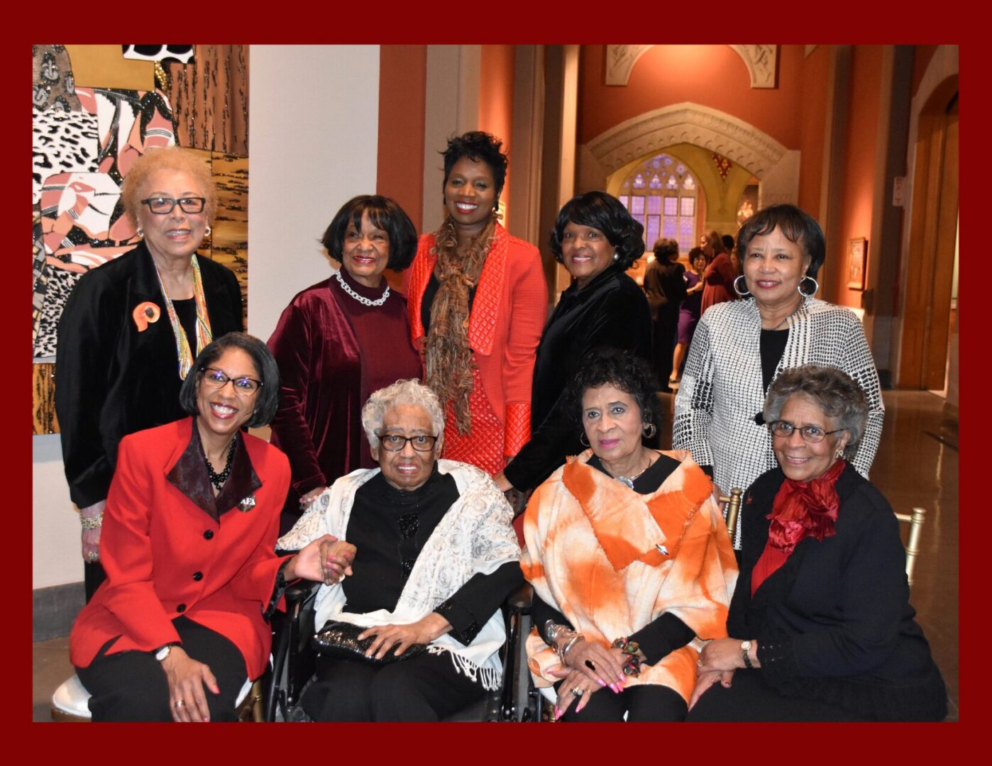 Group of smiling women at formal event